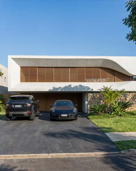 Residential facade with wooden louvers